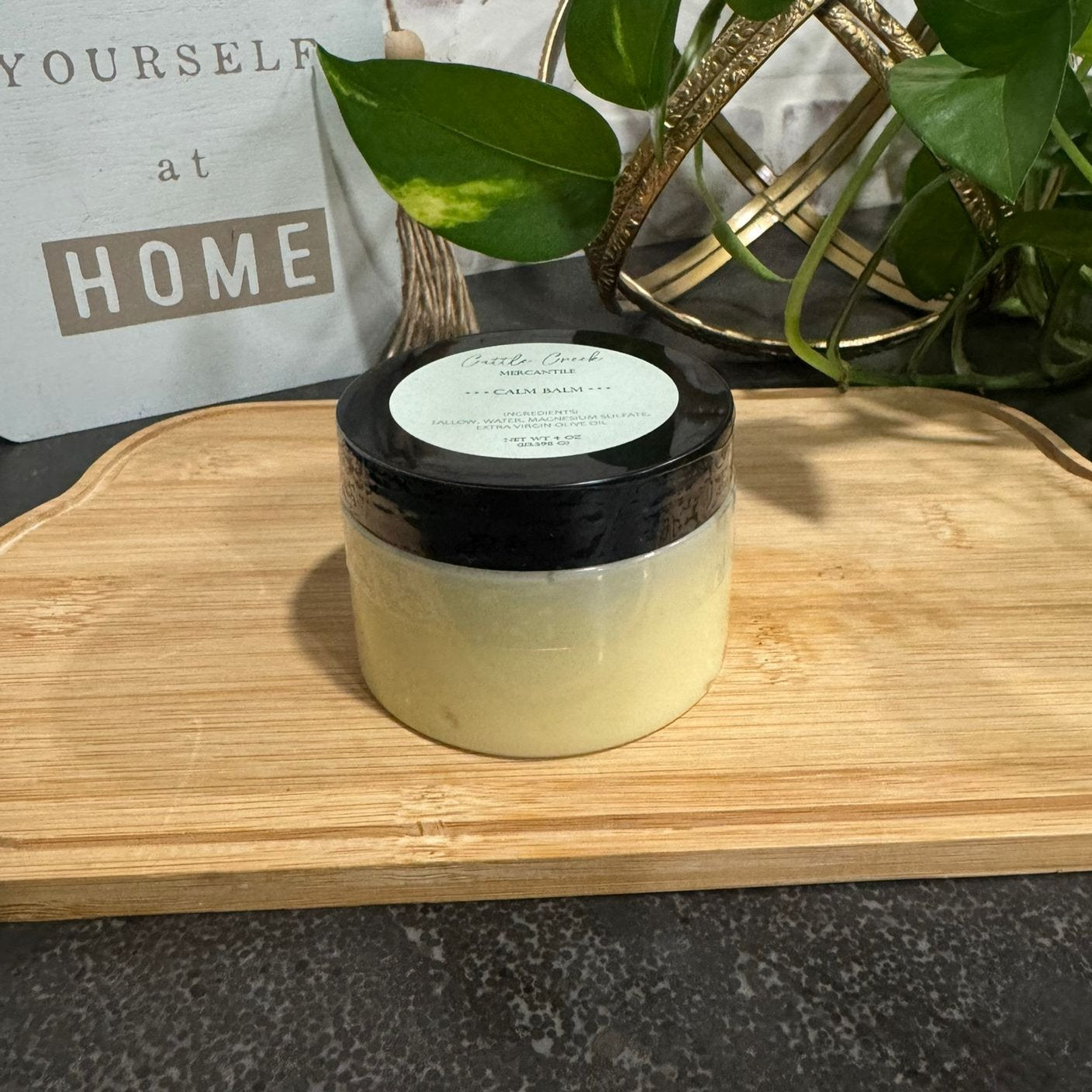 Cattle Creek Mercantile's Calm Balm, infused with calming essential oils and 100% grass-fed beef tallow, promoting relaxation and skin nourishment