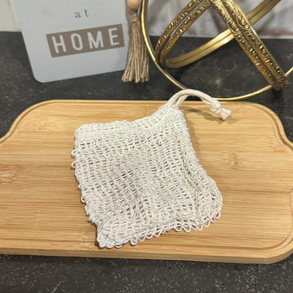 Durable soap saver bag made from eco-friendly materials, designed to extend the life of your soap while creating a rich lather.